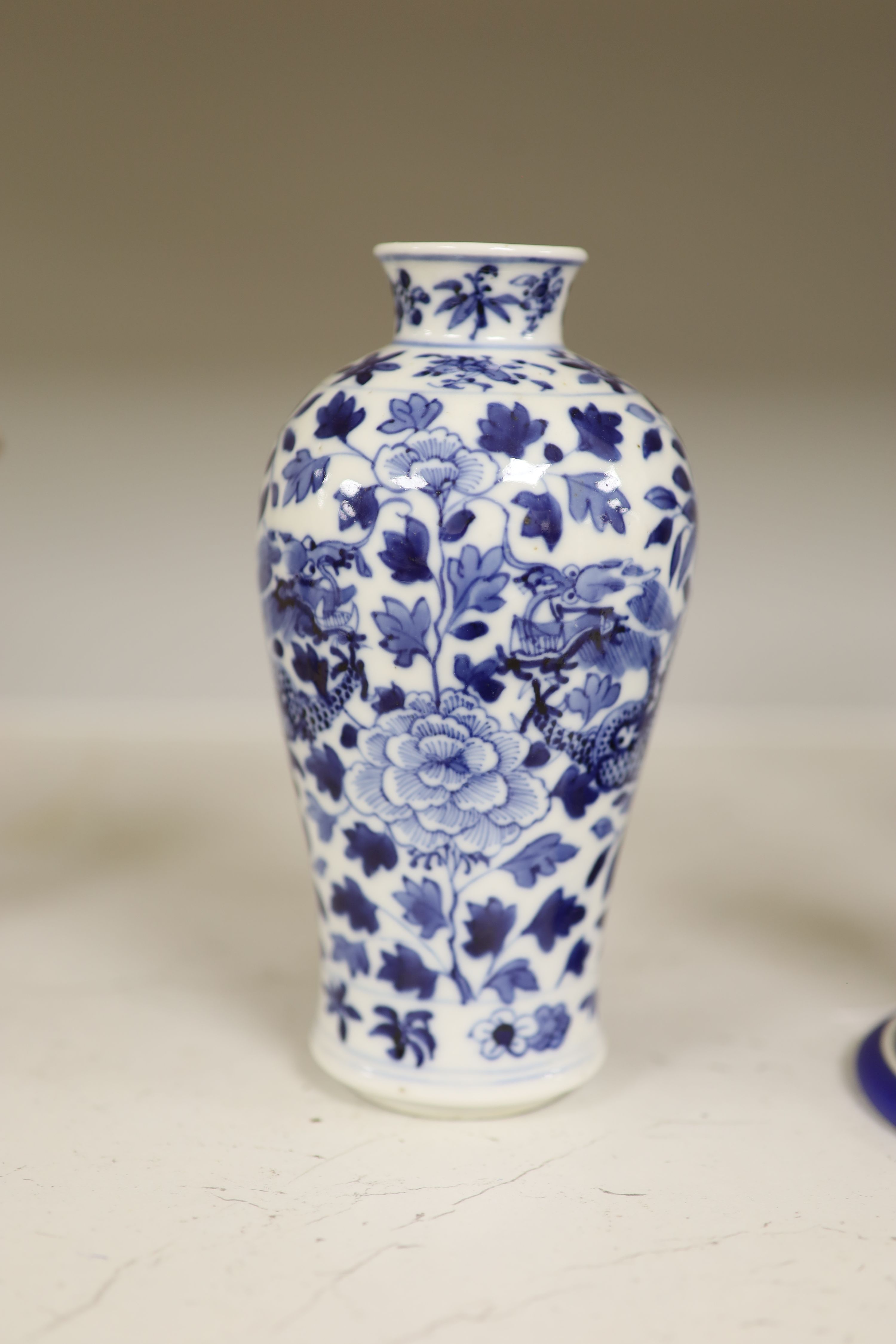 A late 19th century Chinese blue and white dragon vase, height 18cm